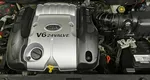 Kia Carnival 2.7 AT (186 л.с.) Красный
