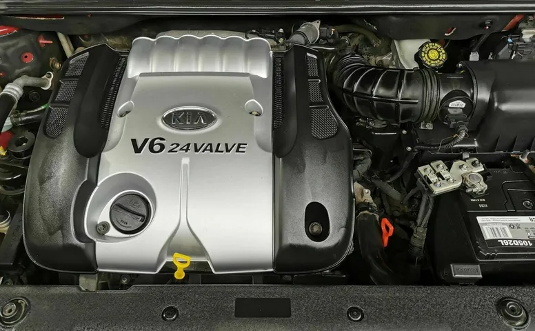 Kia Carnival 2.7 AT (186 л.с.) Красный