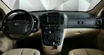 Kia Carnival 2.7 AT (186 л.с.) Красный