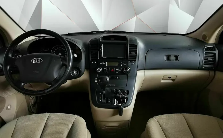 Kia Carnival 2.7 AT (186 л.с.) Красный
