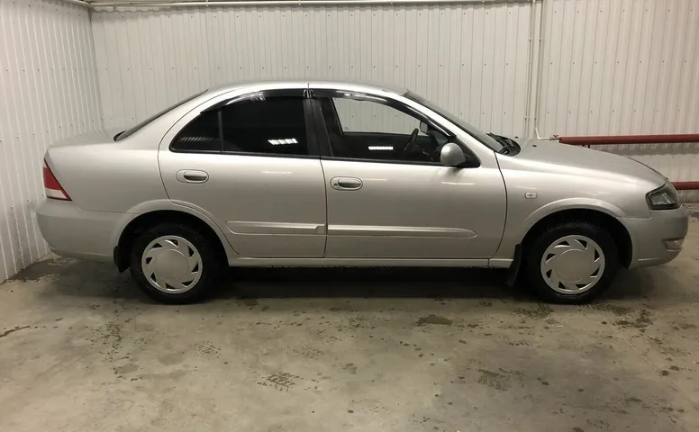 Nissan ALMERA_CLASSIC 1.6 MT (107 л.с.)