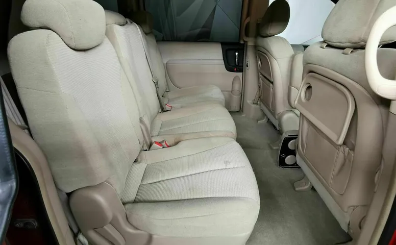 Kia Carnival 2.7 AT (186 л.с.) Красный