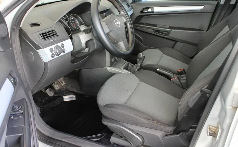 Opel ASTRA 1.8 MT (125 л.с.)