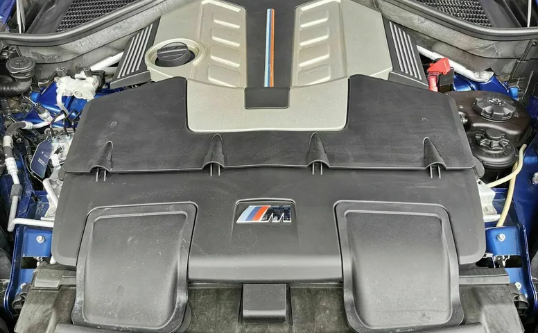 BMW X5 M 4.4 AT (555 л.с.) Синий