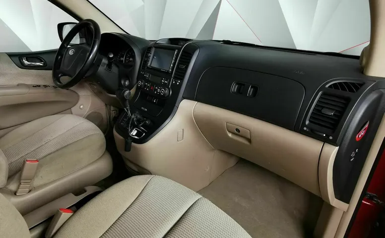 Kia Carnival 2.7 AT (186 л.с.) Красный