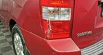 Kia Carnival 2.7 AT (186 л.с.) Красный