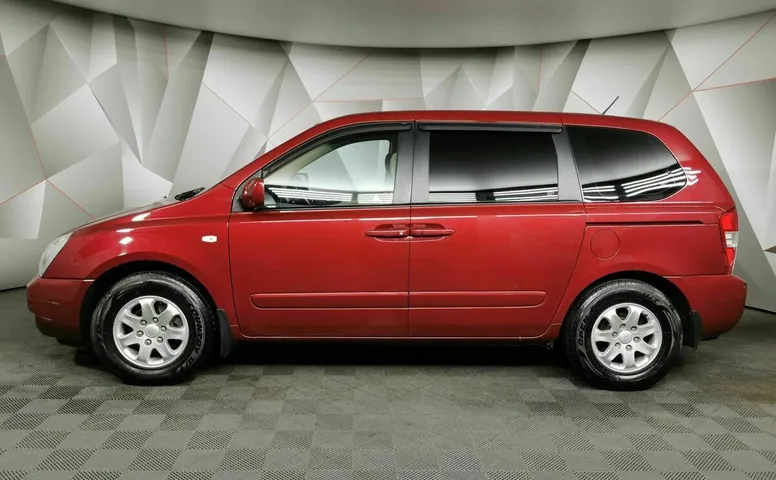 Kia Carnival 2.7 AT (186 л.с.) Красный