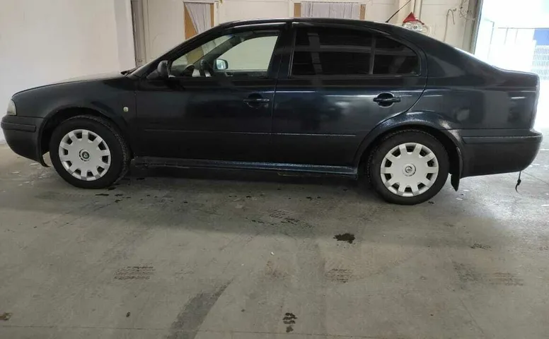 Skoda OCTAVIA 1.6 MT (102 л.с.)