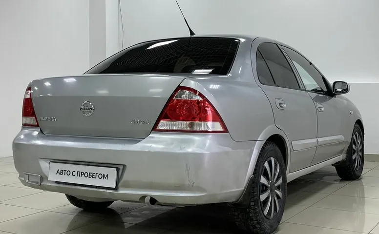 Nissan ALMERA_CLASSIC 1.6 MT (107 л.с.)