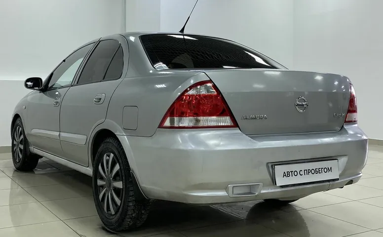 Nissan ALMERA_CLASSIC 1.6 MT (107 л.с.)