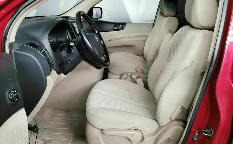 Kia Carnival 2.7 AT (186 л.с.) Красный