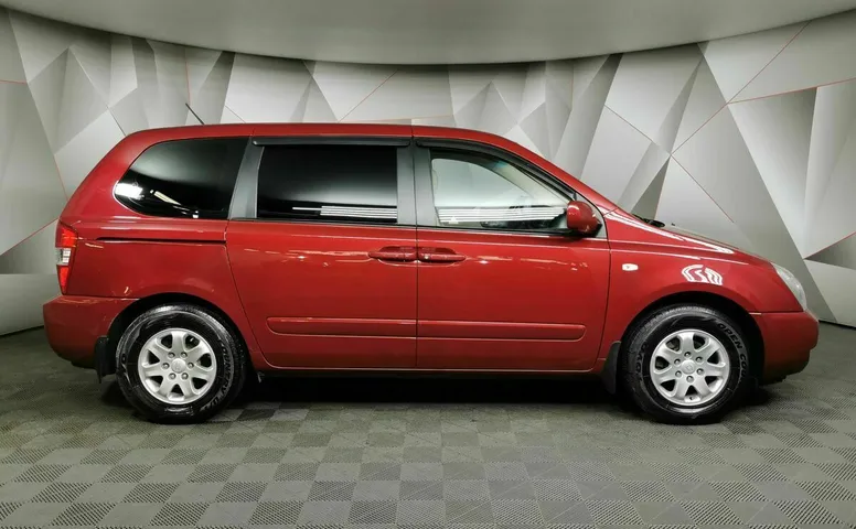 Kia Carnival 2.7 AT (186 л.с.) Красный
