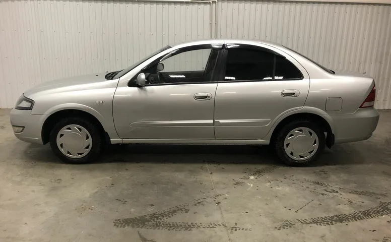 Nissan ALMERA_CLASSIC 1.6 MT (107 л.с.)