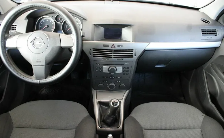 Opel ASTRA 1.8 MT (125 л.с.)