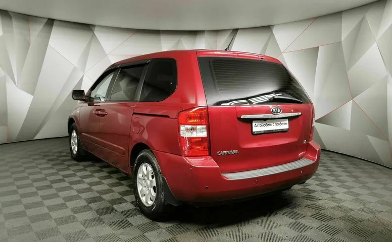 Kia Carnival 2.7 AT (186 л.с.) Красный